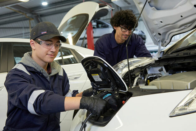 Students working at the Motor Vehicle workshop