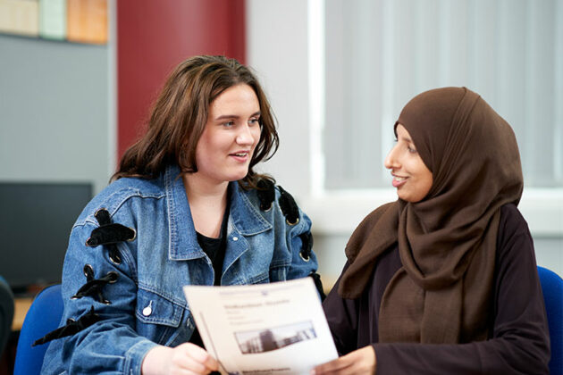 A counselling student with a client