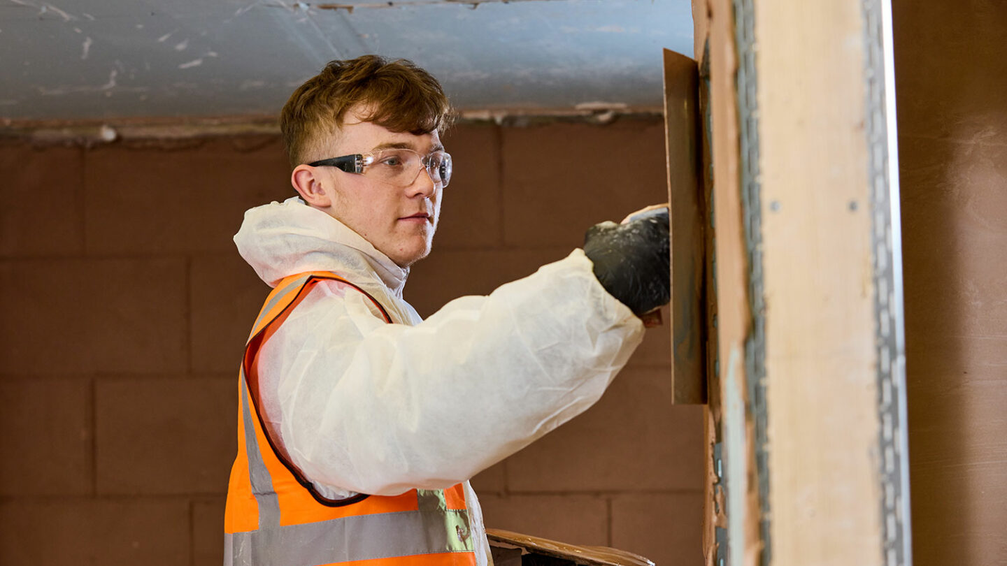 A plastering student