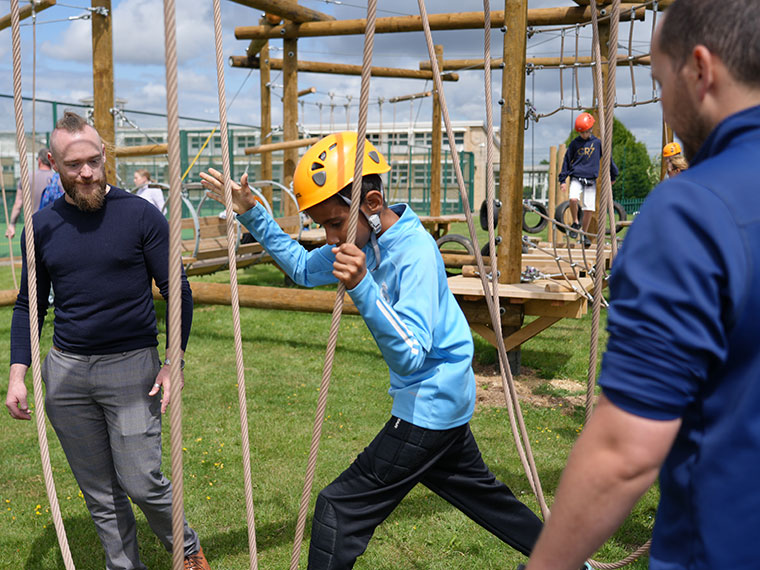 A child on the obstacle course at the Dearne Valley College summer festival