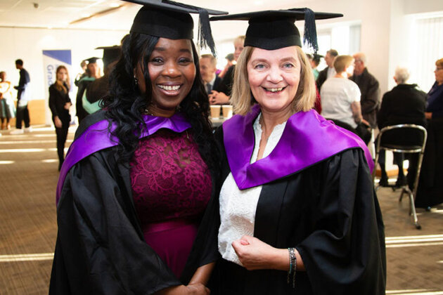 Two ladies at their graduation 2023 ceremony